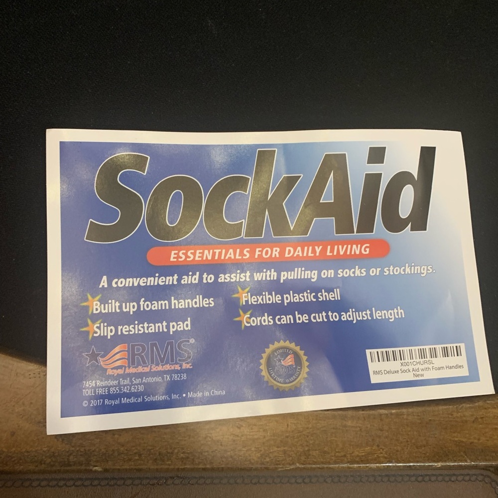 Sock aid helps from surgery or elderly to put your own socks on. new never used